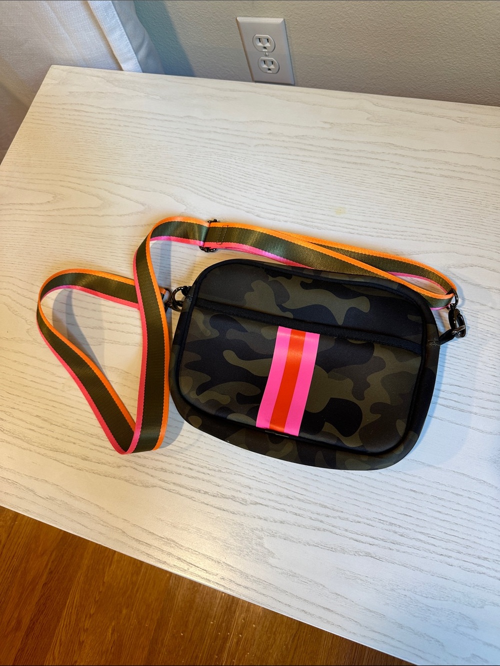 Haute Shore Camouflage Crossbody Bag with Pink Accent Stripe